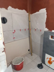 wykończenie łazienki stan deweloperski układanie płytek poznań tarnowo podgórne